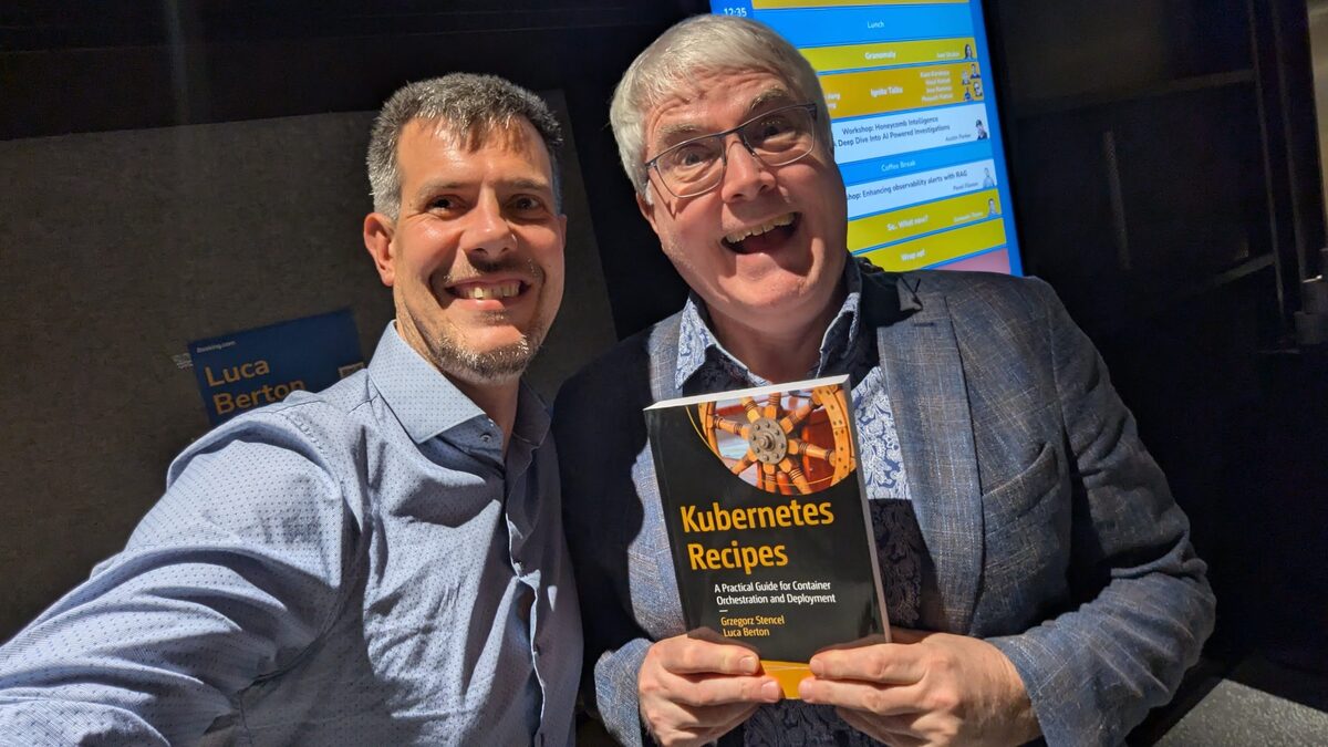 Luca Berton and Grzegorz Stencel with Kubernetes Recipes book at KubeCon EU 2026 Amsterdam
